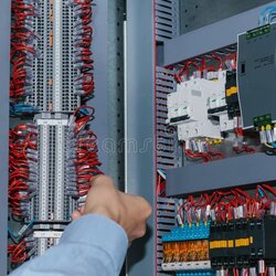 Out Of This World Electrician Specialist Checking Low Voltage Cabinet Equipment Stock Adjusting Photo Male